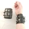 HouseofBasciano double buckle wrist cuffs black side